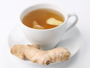 sliced ginger root in tea